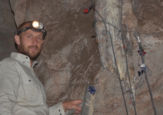 Dr Mark Cuthbert inspects a speleothem in Wellington Caves. (Photo credit: Martin S. Andersen)