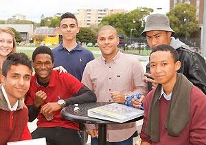 Rapper and alumnus Kid Mac with ASPIRE students