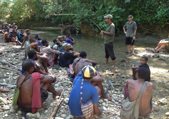 Researchers talking to people from Aitape in Papua New Guinea, near where the 6000 year old Aitape skull was found. Credit: Ethan Cochrane
