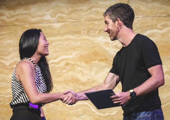 Co-Op Scholarship Program participant Jodie Lee greets Atlassian co-CEO Scott Farquhar at the 2018 induction event.