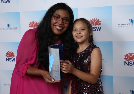 Dr Antoinette Anazodo and her daughter at the 2018 Premier's Awards, recognising excellence in public service.
