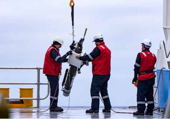 Researchers deploy Argo float from RV Investigator. Photo: Jakob Weis/UTAS