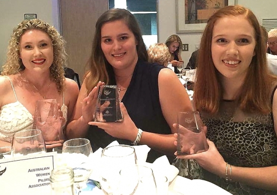 (L-R) Hayley Umbers, Katie Seymour and Renee Close receive their awards at the Australian Women Pilots Association dinner.