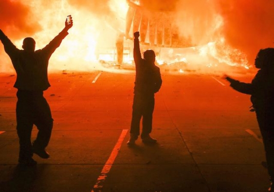 Protesters in Ferguson, Missouri, after the announcement of no charges over a teenager's killing. EPA/Tannen Maury