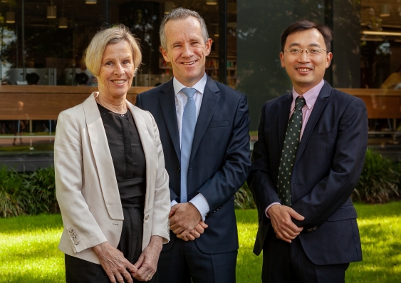 UNSW Law Professor Deborah Healey and UNSW Law Associate Professor Heng Wang join Herbert Smith Freehills Regional Managing Director Andrew Pike outside the UNSW Law building to officially announce the Herbert Smith Freehills CIBEL Centre. Photo: Yve Lavine