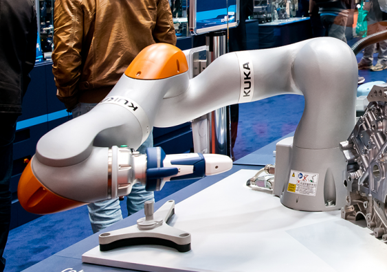 Charlotte Firth's invention - a soft robotic hand - will fit onto the end of cobots Arnold and Betty.  Above: a cobot on show at the Messe Fair in Hanover, Germany, in 2018. Photo: Shutterstock.