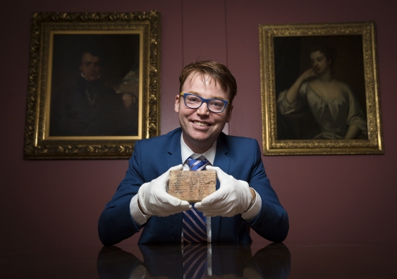 Dr Daniel Mansfield with the Plimpton 322 Babylonian clay tablet in the Rare Book and Manuscript Library at Columbia University in New York. Image: UNSW/Andrew Kelly