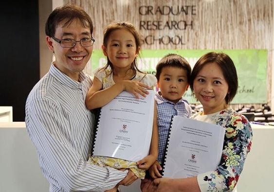 Dr Louis Wang and Dr Emily He with their children Charlotte and Alexander.