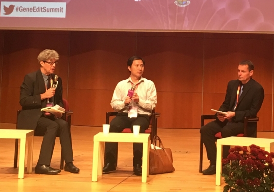 Robin Lovell-Badge (Crick Institute), Jiankui He and Matt Porteus (Stanford) prepare to talk on stage at the International Summit on Human Genome Editing in Hong Kong. Image from Merlin Crossley