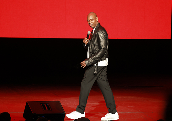 Dave Chappelle performing on stage. Photo: Getty Images