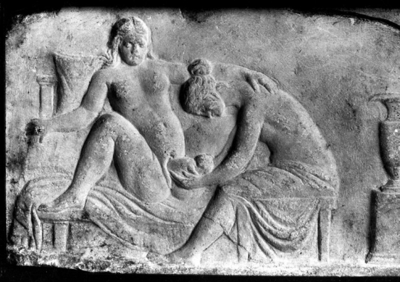 Ancient Roman relief carving of a midwife (Wellcome Trust, photo NO. M0003964EB). Wikimedia Commons, CC BY-SA