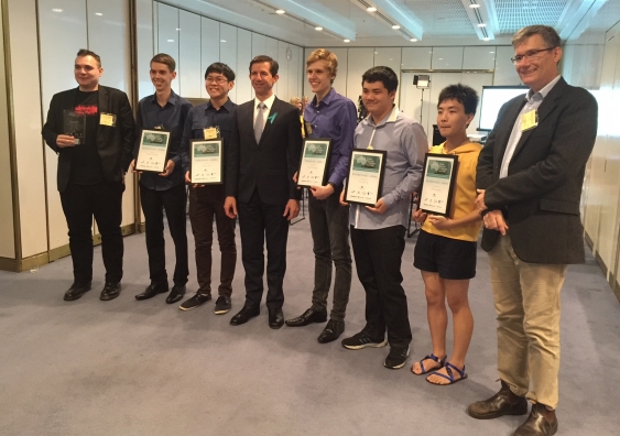 Minister for Education and Training, Simon Birmingham (centre) with five of the 12 UNSW winners, who took out 1st, 2nd and 3rd in the annual Cyber Security Challenge. With them is Adjunct Professor Brendan Hopper (far left) and Associate Professor Richard Buckland (far right).
