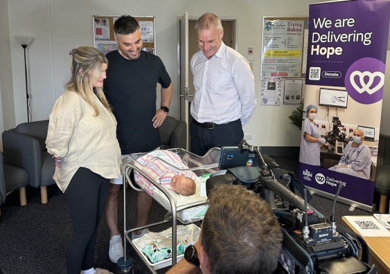 Leanna and Theo Loutas with Professor Robert Gilchrist after the birth of their daughter Bonnie, who is the first Australian baby conceived using CAPA-IVM. Photo: The Royal Hospital for Women.