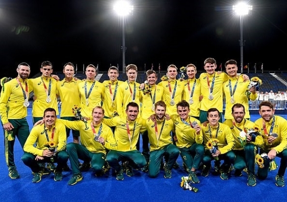 The silver medal provided a glimmer of hope to spur UNSW students Tim Brand (back row, far right) and Dylan Martin (back row, second from right) on to the Commonwealth Games in 2022 and the next Olympics in 2024. Photo: Hockey Australia