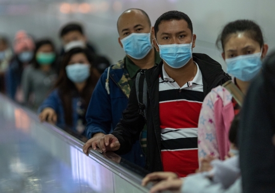 Health authorities estimate each infectious person could pass the virus onto two others. Photo: Jerome Favre/AAP