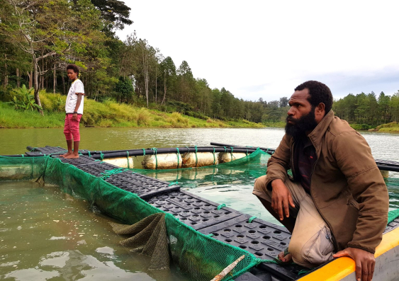 A floating fish farm in Yonki Reservoir in the Eastern Highlands Province of PNG.  The project will work with farmers to optimise feed formulations for caged fish and estimate how many fish can be sustainably farmed. Photo: Jes Sammut.