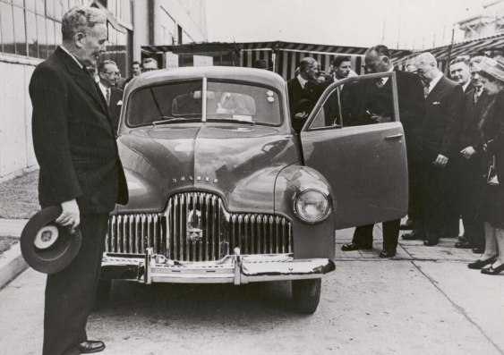 Prime Minister Ben Chifley introducing Australia’s own car, the Holden, at a manufacturing plant in Victoria in 1948. Image: National Library of Australia