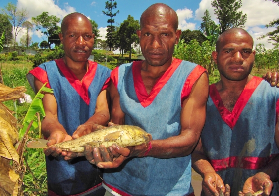 Inmates in the Fish for Prison program show off their catch of the day. Photo: Jes Sammut