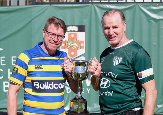 Nick Farr-Jones (left) and Simon Poidevin wil present the Cup bearing their names after the match between the Randwick Galloping Greens and Sydney University this Saturday.