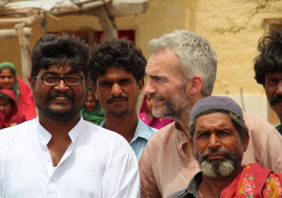 Sanderson with locals in southern Pakistan following the 2012 floods. Photo supplied