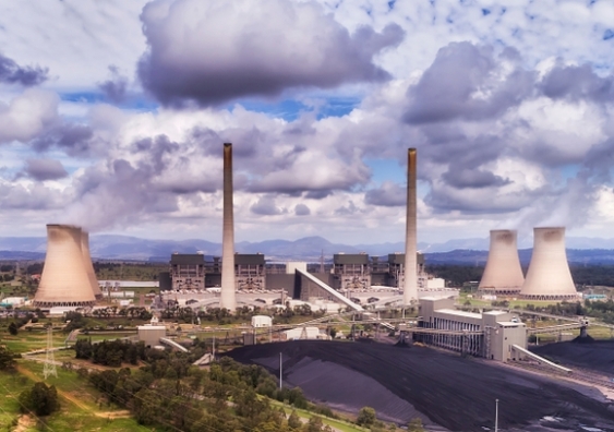 Power lines transmitting electricity away from Bayswater power statiion burning fossil black coal fuel in the middle of Hunter Valley, NSW. Image from Shutterstock