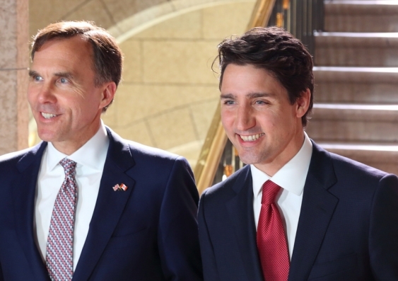 Canada's Finance Minister Bill Morneau, left, and Prime Minister Justin Trudeau enter the House of Commons to present the Liberal government's 2017 budget. Photo: Shutterstock