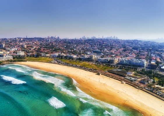 Australia is estimated to have around 12,000 kilometres of sandy coastline at risk from potential sea level rises. Image from Shutterstock.