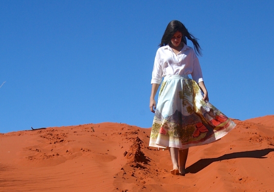 West MacDonnell Ranges, NT.  Artist: Gloria Pannka. Dress-maker – Bernice Bristow, Produced and directed by The Arts Department, Batchelor Institute of Indigenous Tertiary Education and Ngurratjuta Iltja Ntjarra - Many Hands Arts Centre. Modelled by Rita-Mae Ross.  Digital print on cotton linen blend, silk lining. Alice Springs 2015. © Gloria Pannka.