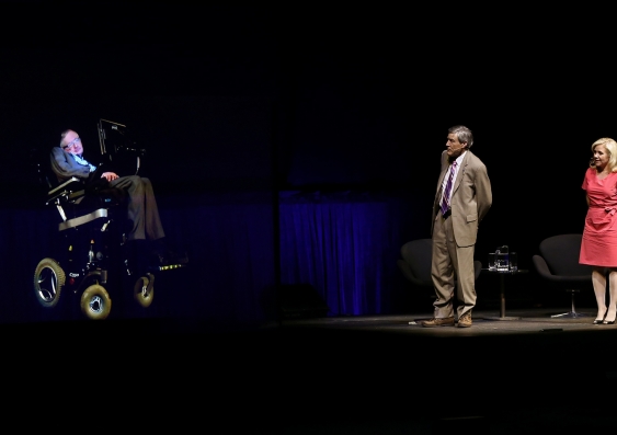 Professor Paul Davies and Lucy Hawking on stage at the Sydney Opera House on Saturday with Professor Stephen Hawking, beaming in via hologram technology from the University of Cambridge. Photo: Prudence Upton