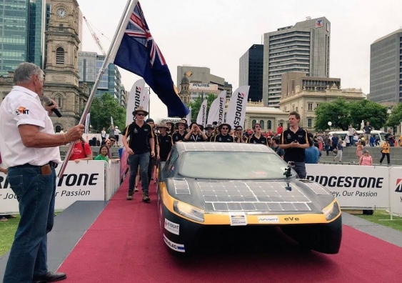 Sunswift eVe traverses the red carpet at Victoria Square in Adelaide, team in tow, after completing the 3,022 km race from Darwin.