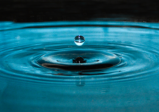 A water drop falling into water. Image: Sarp Saydam/UNSW