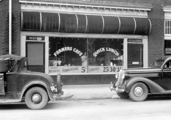 Separate "white" and "colored" entrances to a cafe in North Carolina, 1940. Image: Jack Delano / United States Library of Congress