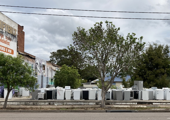 High-income countries including Australia tend to have the highest material footprint and are bigger consumers. Pictured are discarded white goods on Maitland Road, Mayfield, NSW. Photo: Anthony Dean.