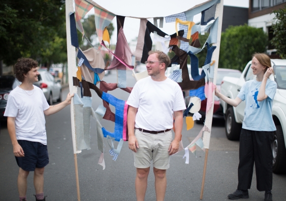 The shapes within the textile banners are abstracted from the phrase Who's laughing jackass, UNSW Honours students Joshua Reeves and Lisa Dwyer with artist Fernando do Campo