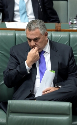 Then treasurer Joe Hockey biting his nails while in session at The House of Representatives, Parliament House