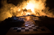 conceptual image of war using chess board