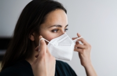 woman wearing respirator mask