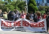 People protesting refugee policy