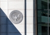 Entrance to the US Securities and Exchange Commission shows emblem on building