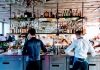 Two waiters working at bar.jpg