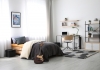 modern teenagers room interior with workplace and bed