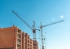 Cranes on residential buildings