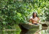 Indigenous man canoeing in Ecuador