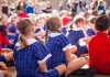 School children sitting in assembly