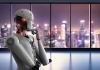 A robot looks out over a city skyline. Image: Shutterstock