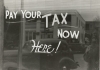 Writing on window says pay your tax here