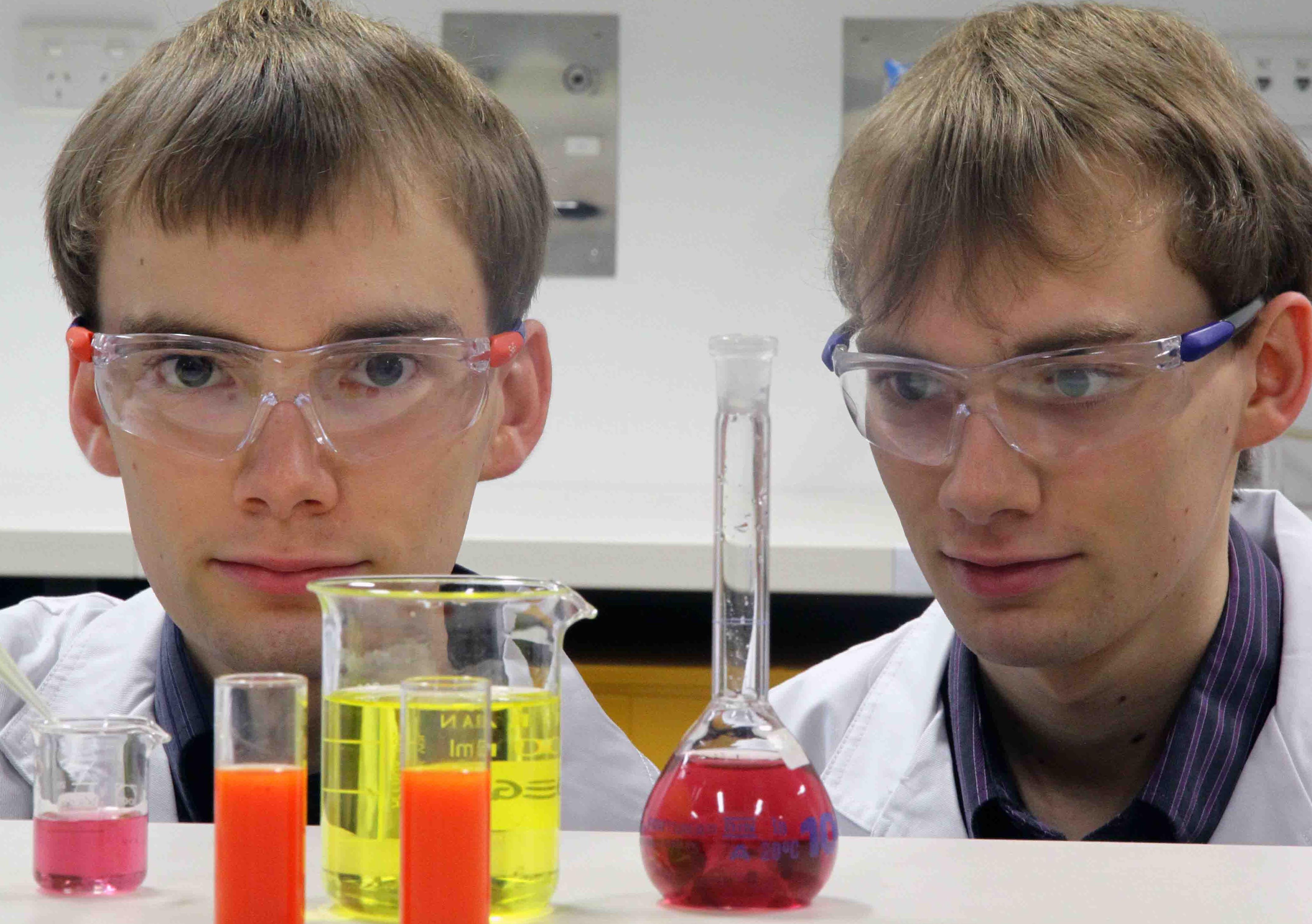 Twin brothers Douglas (left) and Alex Dunn are making nanoparticles for carrying cancer drugs more patient-friendly.