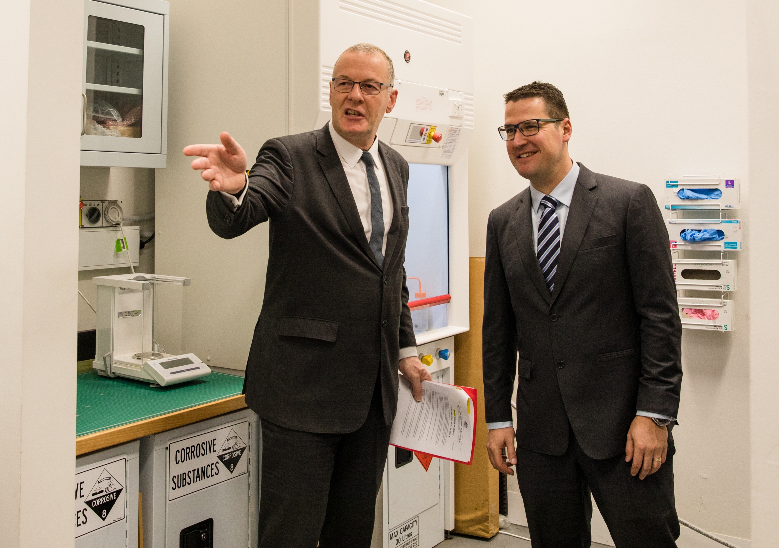 Brian Boyle, UNSW Deputy Vice-Chancellor for Enterprise (left) and Zed Seselja, Assistant Minister for Science, Jobs and Innovation, tour a School of Materials and Manufacturing lab where UNSW researchers are working to develop an industry first ecofriendly and non-toxic fire retardant.