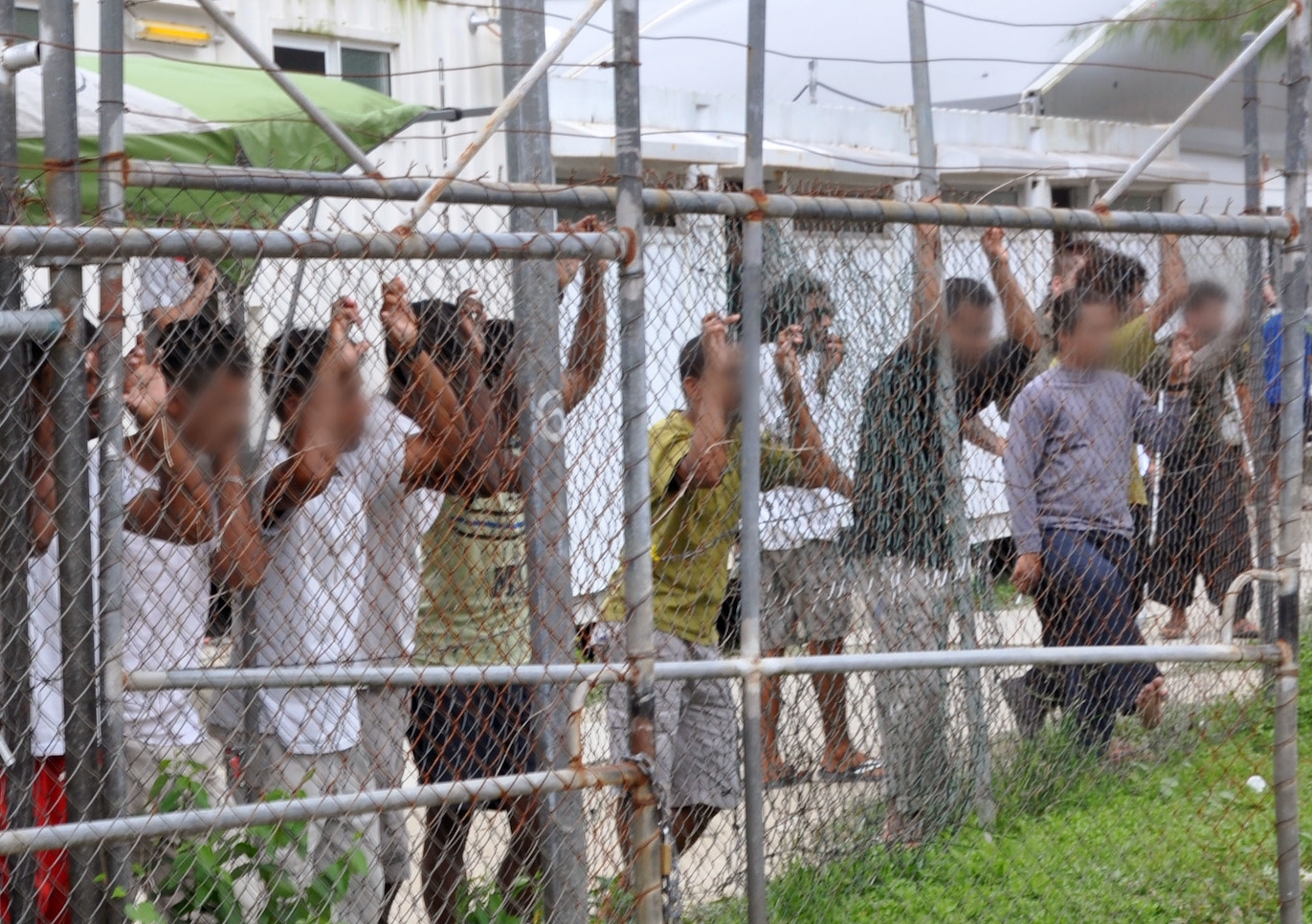 Asylum seekers at the Manus Island detention centre in Papua New Guinea in 2014. Photo: Eoin Blackwell/AAP