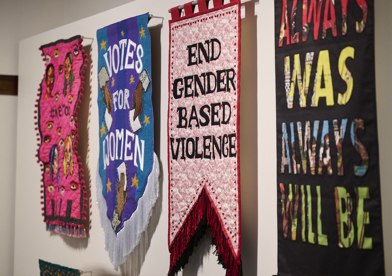 Feminist Banner Series (2022) by Tal Fitzpatrick at Old Parliament House in Canberra as part of the Changemakers Exhibition. Photo: Museum of Australian Democracy, Canberra / Pew Pew Studio.